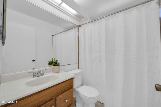 full bathroom with vanity and toilet