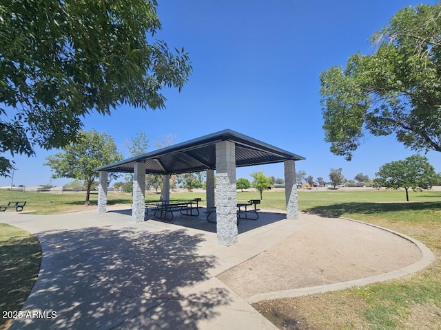 view of community featuring a yard and a gazebo