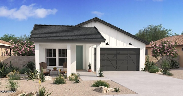 modern inspired farmhouse with a garage