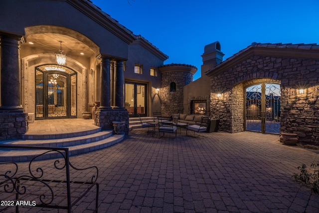 view of patio / terrace featuring outdoor lounge area and french doors