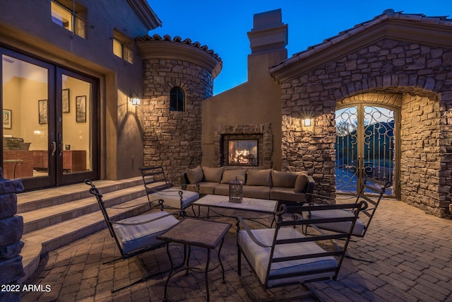 view of patio with french doors and an outdoor hangout area