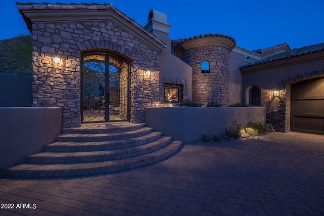 entrance to property with a garage