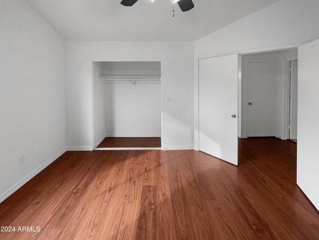 unfurnished bedroom featuring ceiling fan, dark hardwood / wood-style floors, and a closet