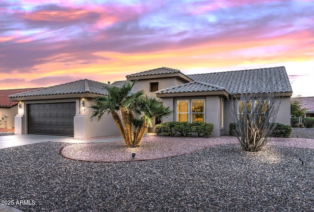 view of front of home with a garage