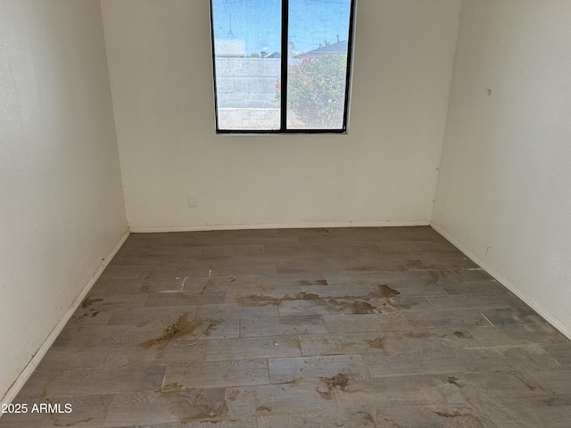 121 N Brown Ave, Casa Grande, AZ 85122 - empty room featuring wood finished floors and baseboards