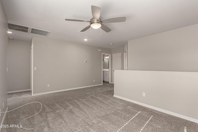 carpeted empty room featuring ceiling fan