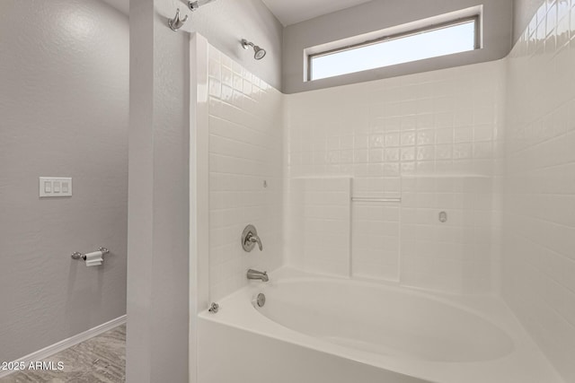 bathroom with bathtub / shower combination