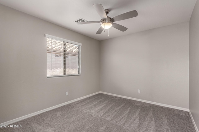 empty room with carpet floors and ceiling fan