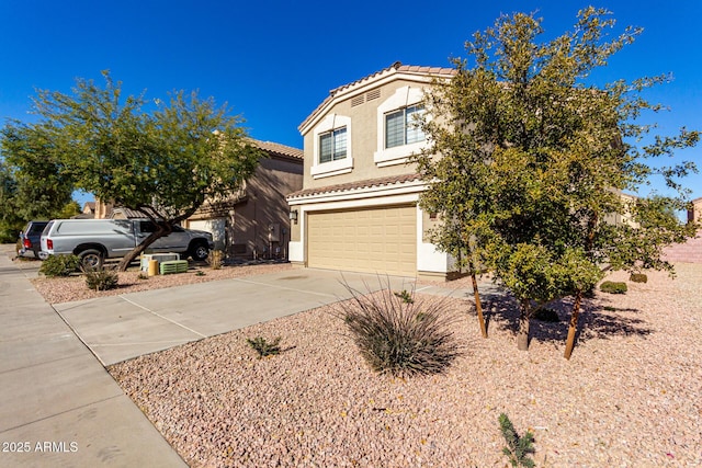 view of front of home with a garage