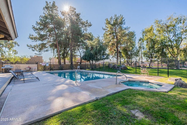 view of pool featuring a lawn, a community hot tub, and a patio