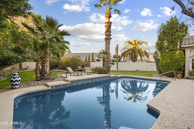 view of swimming pool featuring a patio