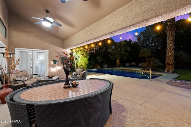 view of patio featuring an outdoor living space and ceiling fan