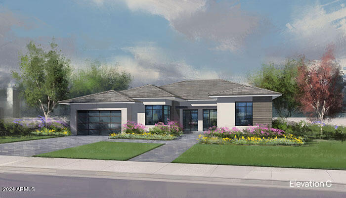 1535 W Wagon Wheel Dr, Phoenix, AZ 85021 - view of front facade featuring decorative driveway and a garage