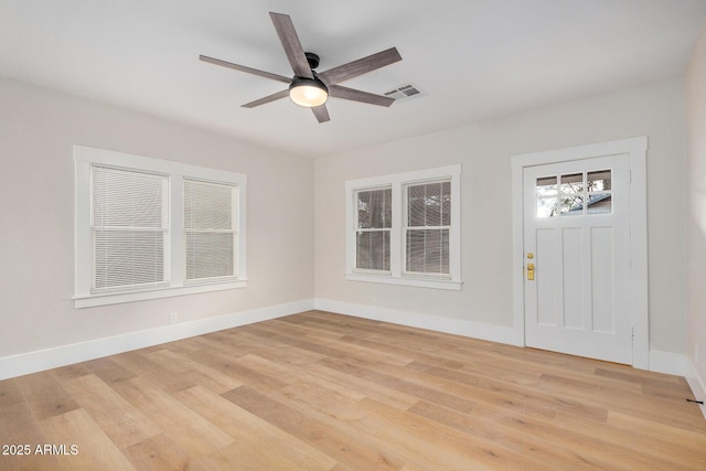 foyer entrance featuring light hardwood / wood-style flooring and ceiling fan