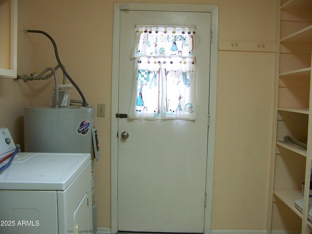 laundry room with laundry area and washer / dryer