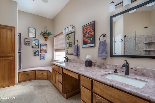 bathroom with vanity and an enclosed shower