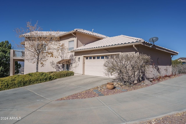 view of front of home with a garage