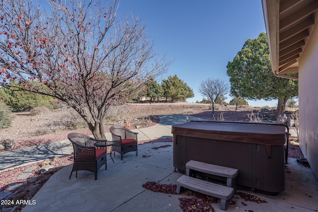 view of patio with a hot tub