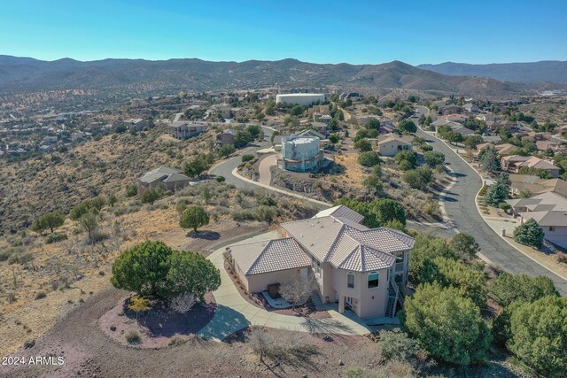 drone / aerial view featuring a mountain view