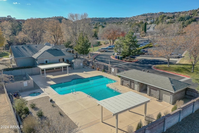 view of pool featuring a patio area