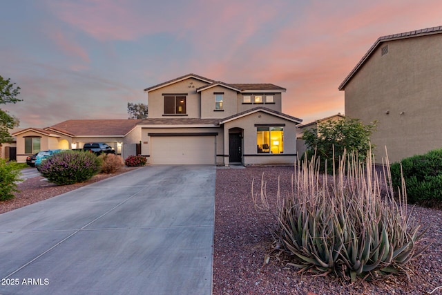 1647 W Gold Mine Way, San Tan Valley, AZ 85144 - view of front of home with stucco siding, concrete driveway, and a garage