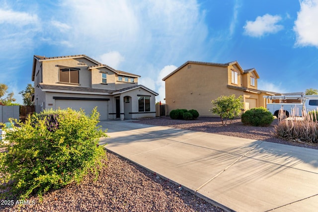 1647 W Gold Mine Way, San Tan Valley, AZ 85144 - view of front of property with driveway, stucco siding, a garage, and fence
