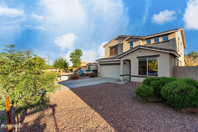 1647 W Gold Mine Way, San Tan Valley, AZ 85144 - traditional-style home with concrete driveway, an attached garage, stucco siding, and fence