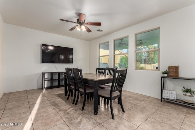 1647 W Gold Mine Way, San Tan Valley, AZ 85144 - dining space featuring a ceiling fan and light tile patterned flooring