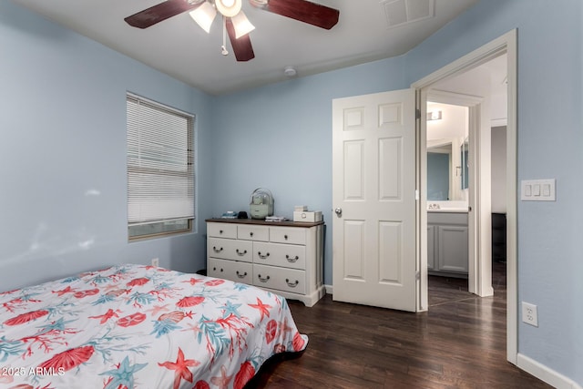 1647 W Gold Mine Way, San Tan Valley, AZ 85144 - bedroom with dark wood-style flooring, baseboards, and a ceiling fan