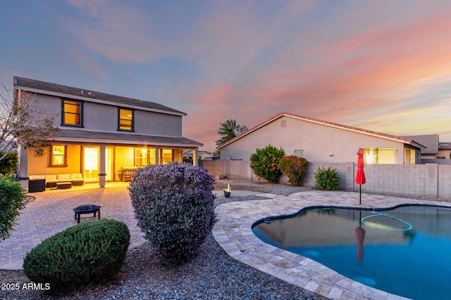 1647 W Gold Mine Way, San Tan Valley, AZ 85144 - view of pool featuring an outdoor living space, a patio area, and a fenced backyard