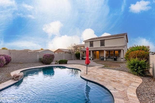 1647 W Gold Mine Way, San Tan Valley, AZ 85144 - view of swimming pool with a patio and a fenced backyard