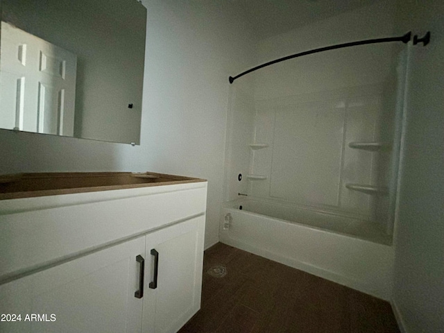 bathroom with vanity and tub / shower combination