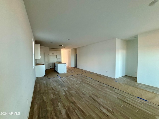 unfurnished living room with light hardwood / wood-style flooring