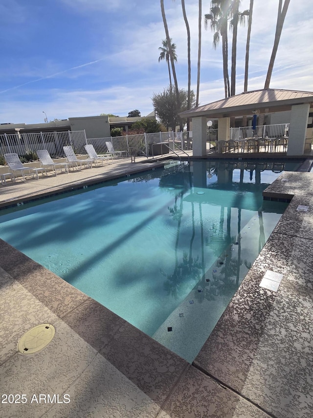 view of pool featuring a patio