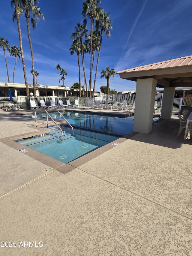 view of swimming pool featuring a patio