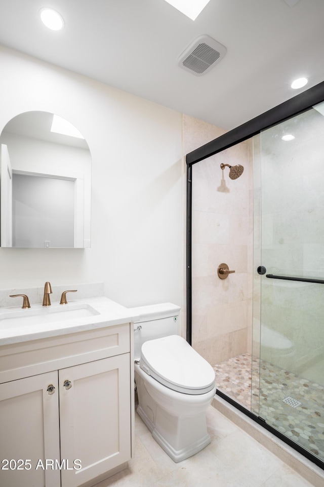 4525 N 66th St Unit 95, Scottsdale, AZ 85251 - full bathroom with a shower stall, toilet, vanity, recessed lighting, and tile patterned floors