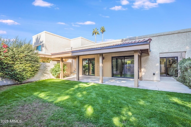4525 N 66th St Unit 95, Scottsdale, AZ 85251 - back of house with stucco siding and a patio area