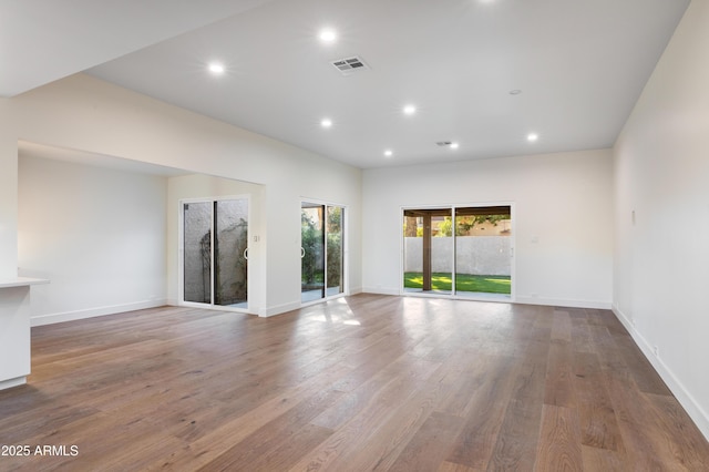 4525 N 66th St Unit 95, Scottsdale, AZ 85251 - empty room featuring wood finished floors, recessed lighting, and baseboards