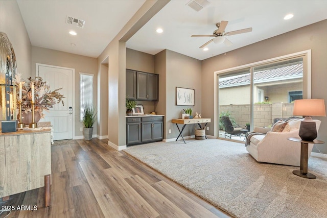 entrance foyer featuring wood finished floors, recessed lighting, baseboards, and visible vents