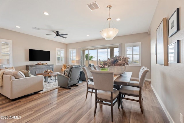 dining area with visible vents, recessed lighting, light wood-style floors, baseboards, and ceiling fan