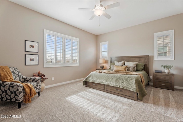 carpeted bedroom featuring ceiling fan and baseboards