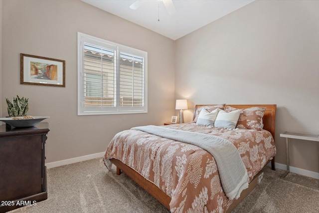 carpeted bedroom featuring a ceiling fan and baseboards