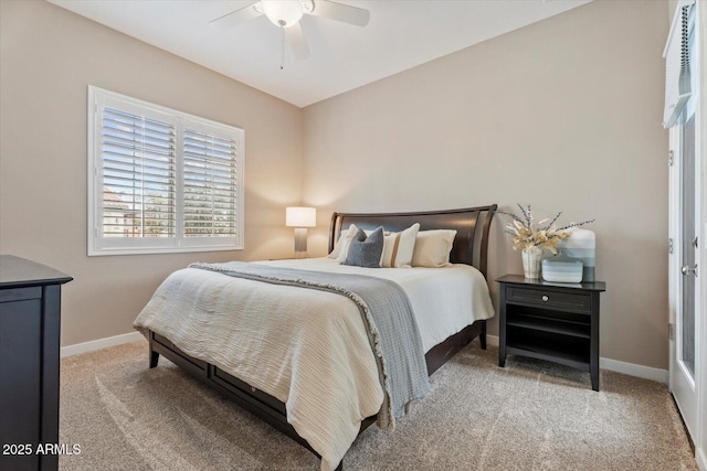 bedroom with baseboards, a ceiling fan, and carpet flooring