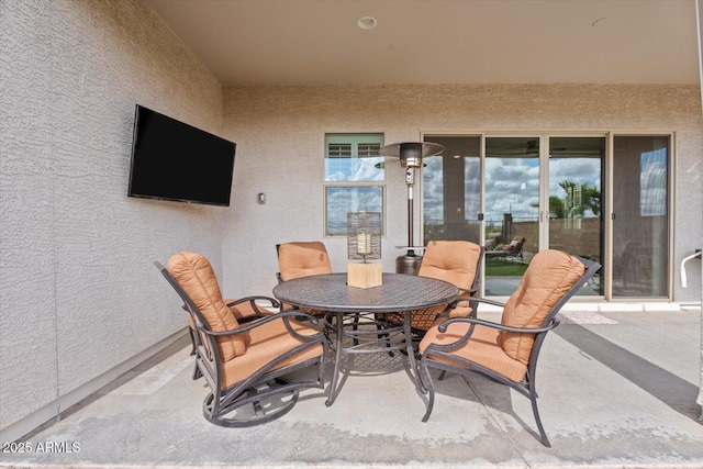 view of patio with outdoor dining area