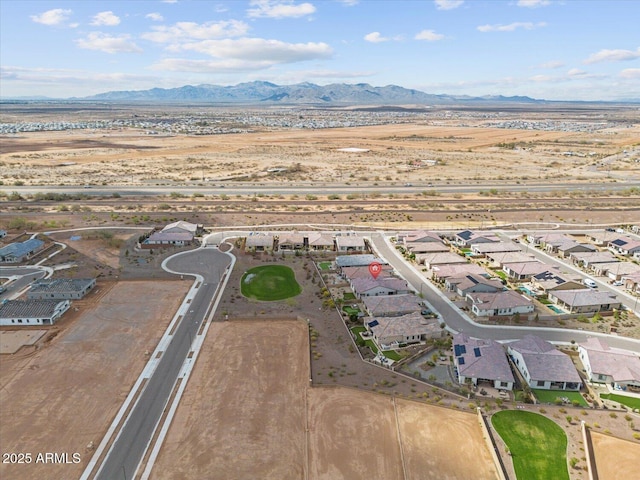 drone / aerial view featuring a mountain view and a residential view