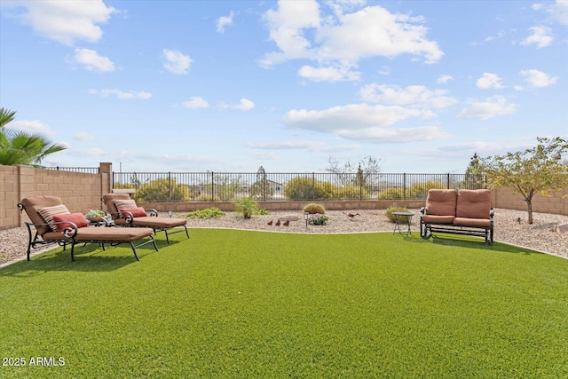 view of yard with a fenced backyard