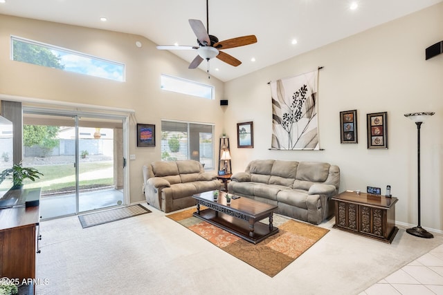 tiled living room featuring baseboards, recessed lighting, high vaulted ceiling, and ceiling fan