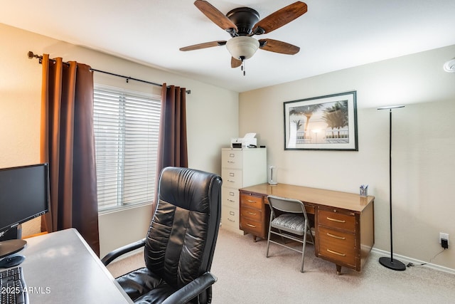 office space with light colored carpet and ceiling fan