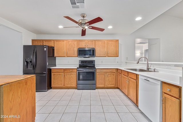 kitchen featuring black refrigerator with ice dispenser, dishwasher, sink, electric stove, and ceiling fan