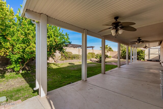 view of patio / terrace featuring ceiling fan